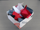 A collection of origami made by visitors to the Re: Exhibition of experimental artists books, collected in an origami box made from one of the posters.